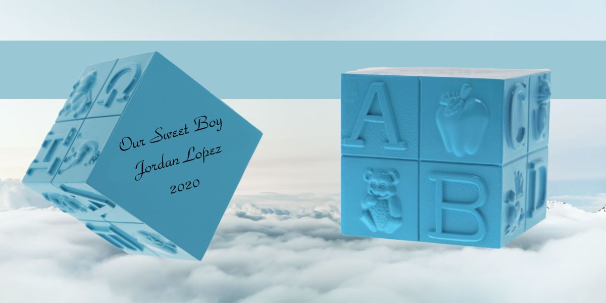Blue block infant urn with "Our Sweet Boy Jordan Lopez 2020" written.