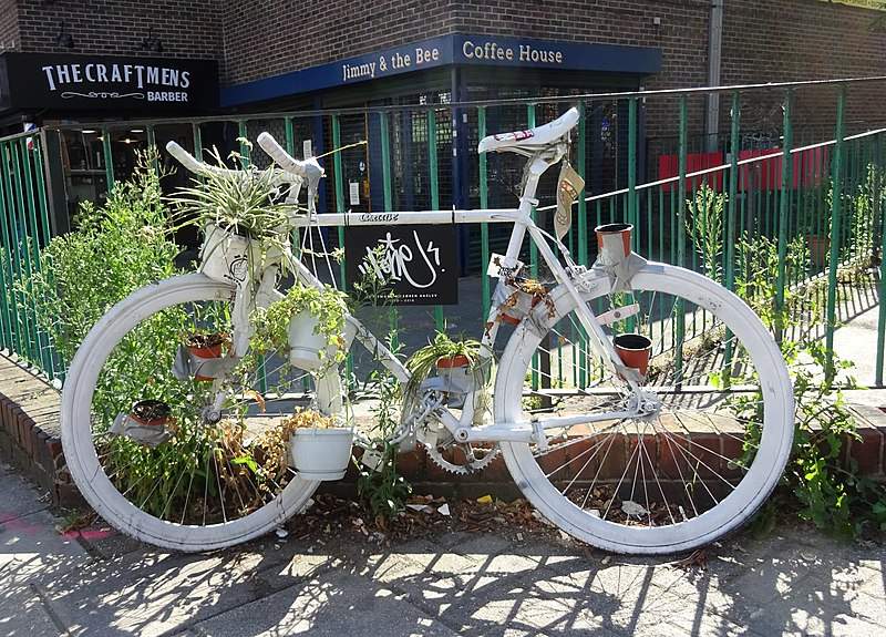 White ghost bike roadside memorial.