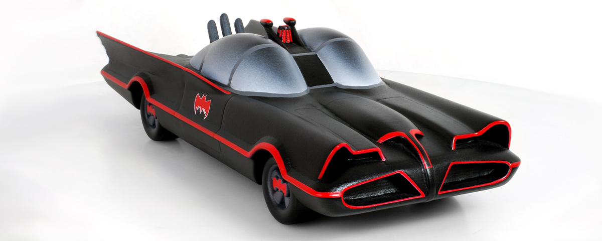 A 3D-printed custom cremation urn resembling the black and red car Batman drove in the 1966 television series.