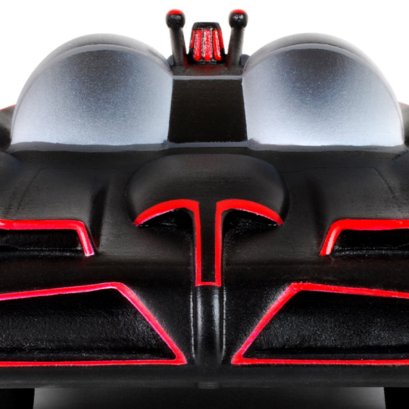 A close-up of the front of the 3D-printed custom cremation urn showing the bubble dome and front bumper of the car.