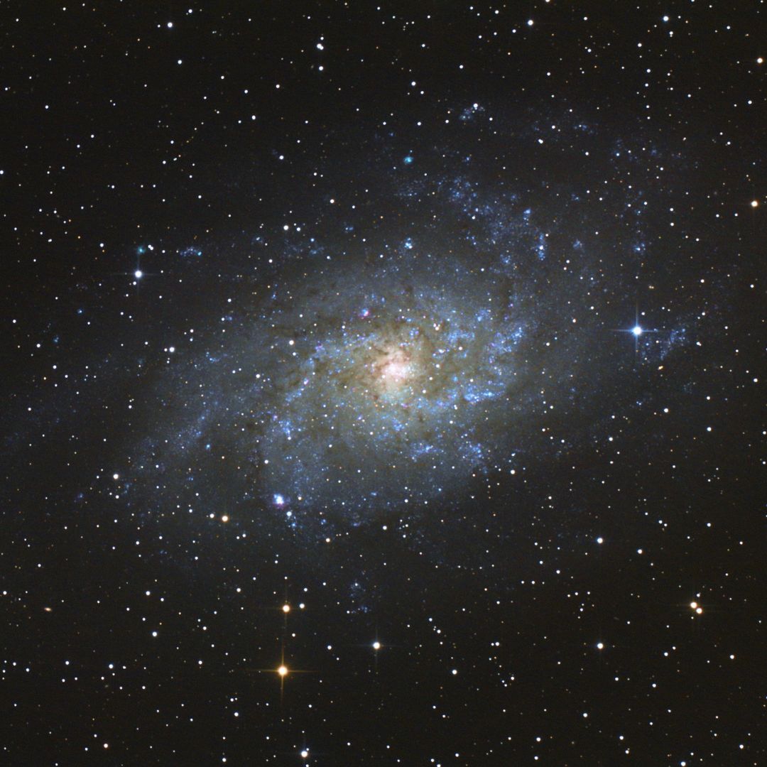 Outer space image of a spiral galaxy.