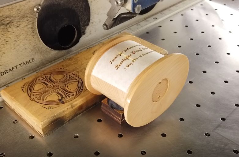 Laser engraving cremation urns.