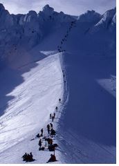 Group of people heading up Mount Hood for Kent's Ceremony.
