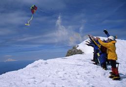 Flying kites for Kent's Ceremony on Top of Mount Hood.