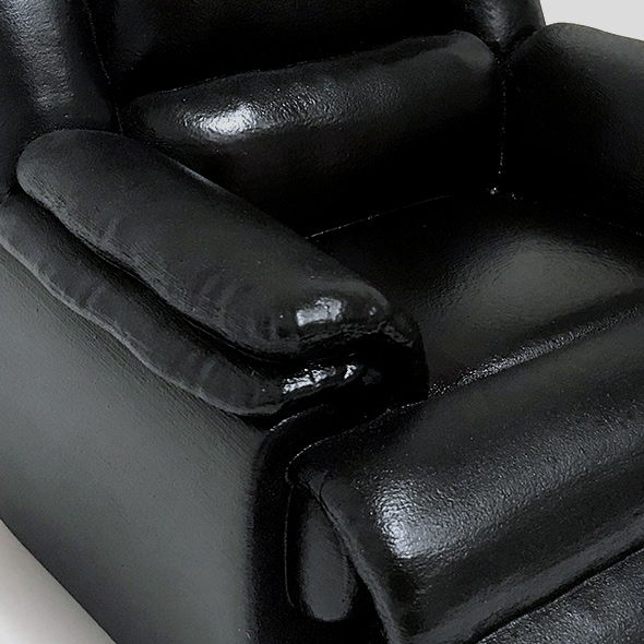 A close-up of the 3D-printed recliner custom cremation urn.